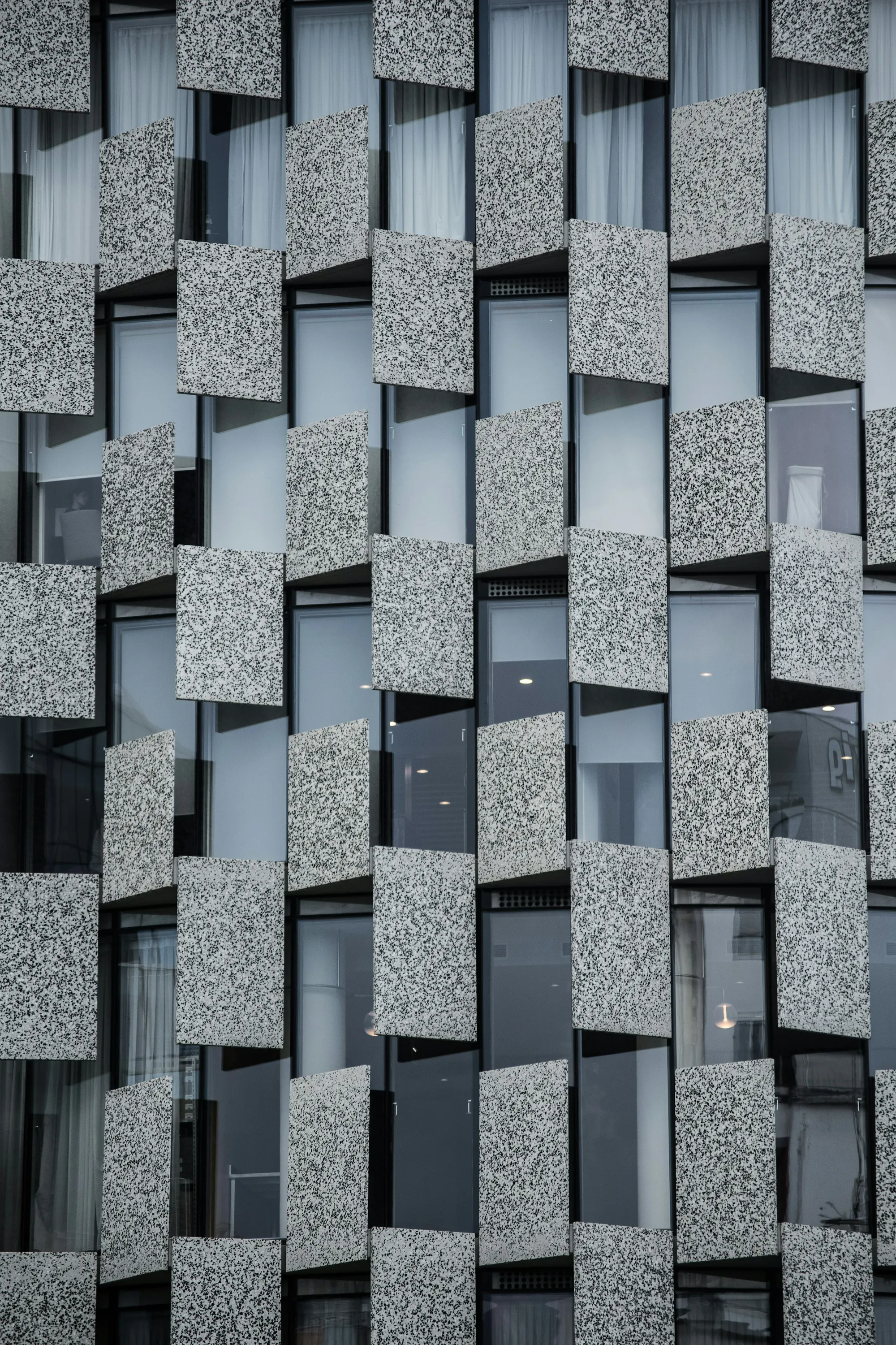 Patterned stone and glass facade